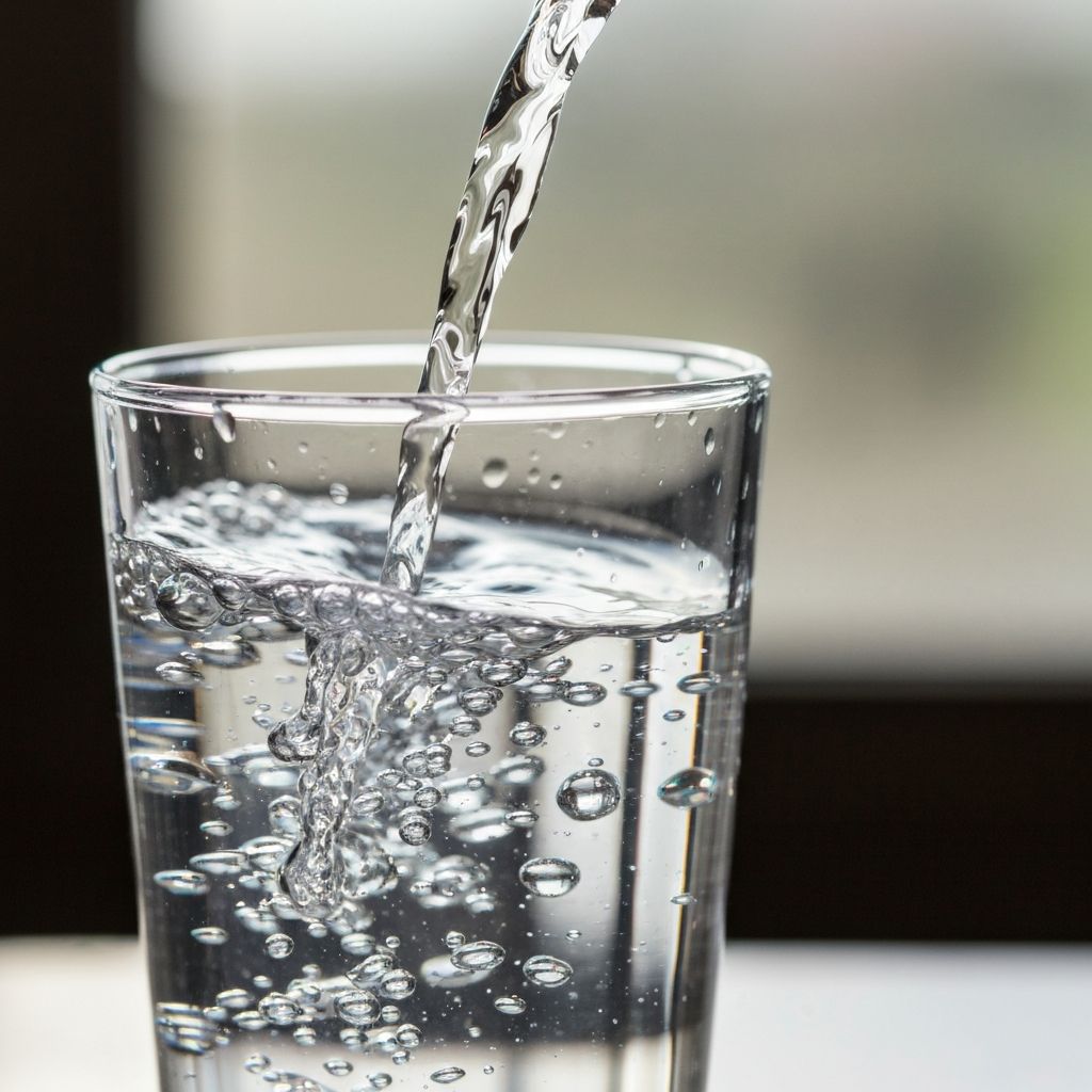 Water pouring into glass